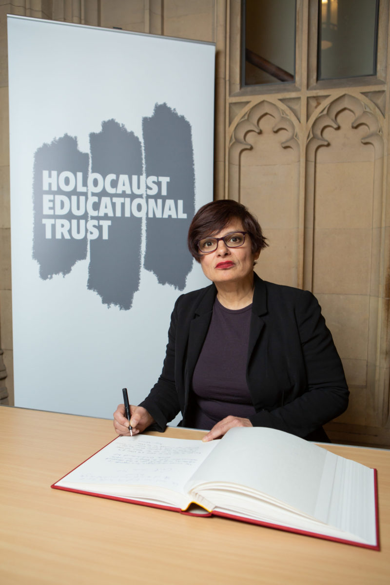 Thangam Debbonaire MP signs the Book of Commitment.